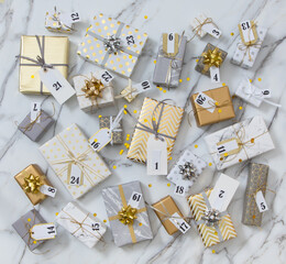 Wall Mural - Many gift boxes with labels numbers for Advent calendar wrapped in glossy classical pack ready for celebrating holiday