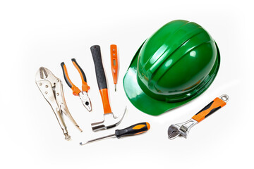 Helmet Safety Hand tools, Work Gloves and Hammer, isolated on white background, Yellow safety helmet for construction and tools on white background.