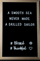 Wall Mural - A Smooth Sea Never Made A Skilled Sailor. Inspiring Quote Board. Retro