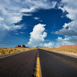 Leinwandbild Motiv Empty scenic highway in Monument Valley