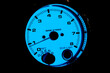 Sport tuning tachometer blue glowing display showing engine idle speed