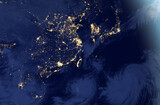 Fototapeta Dmuchawce - East Asia at night from space, elements of this photo was furnished by NASA.