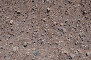 Sticker - Closeup surface texture with small stones on a dirty ground