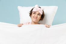 Young Disappointed Sad Awaken After Nightmare Woman In Pajamas Jam Sleep Eye Mask Rest Relax At Home Lie In Bed Pillow Under Blanket Isolated On Pastel Blue Background Bad Mood Night Bedtime Concept