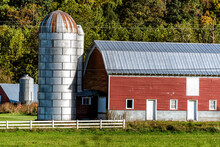 Metal Barn With Silo In Autumn Fall Field In Countryside Landscape Of Farm Farmland In West Virginia Near Seneca Rocks And Red House Building