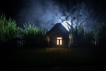 Wall Mural - full moon over quiet village at night. beautiful night landscape of mountain village under the moonl