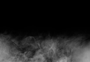 Wall Mural - white smoke or fog isolated on black background.