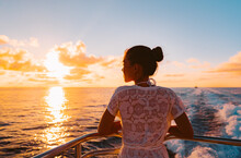 Cruise Ship Vacation Woman Watching Sunset Boat Deck On Summer Travel. Silhouette Of Tourist Relaxing On Outdoor Balcony Of Boat Ferry.