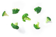 Broccoli Florets Flying On A White Background. The Concept Of A Healthy Diet