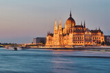 Fototapeta Miasto - Beautiful building of Parliament in Budapest, Hungary, a popular travel destination at sunset