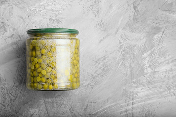 Wall Mural - Glass jar of canned legumes top view