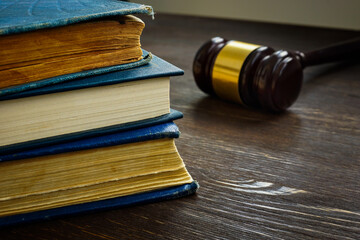 Wall Mural - Law and justice concept. Stack of book and gavel.