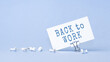 © AstiMak - Back to work - concept of text on business card