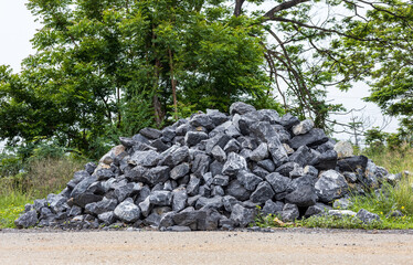 Wall Mural - Granite pile on the side of the country road.