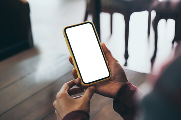 cell phone blank white screen mockup.woman hand holding texting using mobile on desk at office.background empty space for advertise.work people contact marketing business,technology