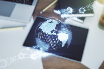 Aufkleber - Creative abstract robotics technology hologram with globe and modern digital tablet on desktop on background, top view, artificial intelligence and machine learning concept. Multi exposure