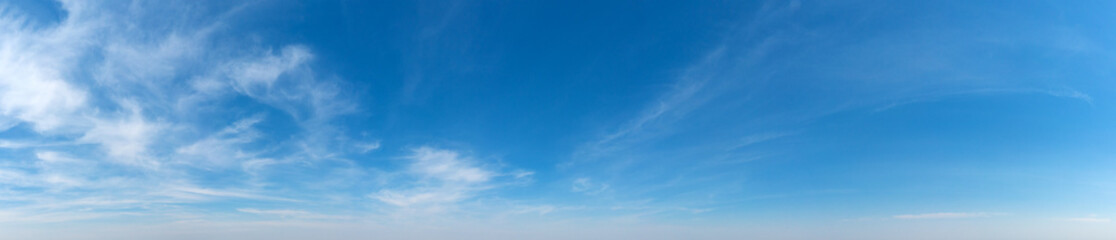 Wall Mural - blue sky background with tiny clouds. panorama background