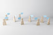 © Who is Danny - Multiple wooden figures with speech clouds on a light background. Social network and communication concept, 3d rendering