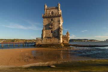 Wall Mural - Belem Tower is a fortified tower on the Tagus river at sunset. Lisbon. Portugal. UNESCO World Heritage Site. Top tourist attraction in Europe. Concept of travel and tourism.