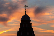 Black Silhouette Of Church Dome With A Cross In The Sunset, Sunrise Sky