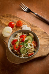 Sticker - quinoa salad with tomatoes pepper cucumber onion and mint leaf