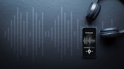 Podcast music. Mobile smartphone screen with podcast application, sound headphones. Audio voice with radio microphone on black background. Broadcast media music banner with copy space.