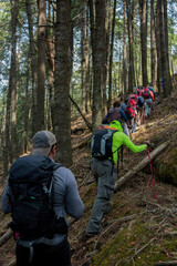 a group of hikers with backpacks hiking through the forests of iztaccihuatl in mexico