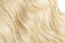 Close Up Of Single Piece Clip In Wavy Platinum Blonde Synthetic Hair Extensions