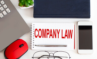 Poster - Notebook with Toolls and Notes about COMPANY LAW, business