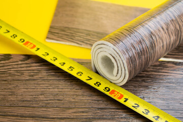 Sticker - Linoleum tape measure and knife on an isolated background.