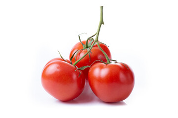 Wall Mural - A branch of three fresh red tomatoes isolated on a white background.