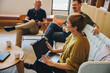 © Jacob Lund - Businesswoman brainstorming new ideas with team