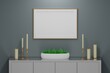 © dariaren - Mockup template with large a4 horizontal blank frame and cabinet with candles, potted plant