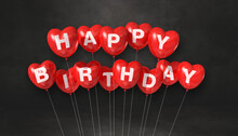 Red Happy Birthday Heart Shape Air Balloons On A Black Background Scene. Horizontal Banner