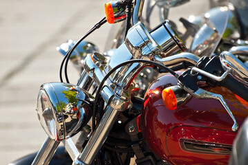 Motorcycle steering wheel closeup. Chrome steering wheel elements.