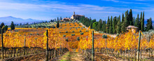 Autumn Scenery. Countryside Of Tuscany. Golden Vineyards And Castle Castello Di  Banfi. Italy