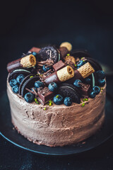 Wall Mural - Chocolate cake with sweets and cookies