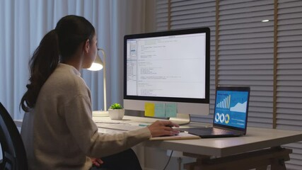 Back view young asia female people analyst coder code language multiple screen cloud online computing ai deep tech work at home office late night reskill upskill, future agile cyber ux web design job.