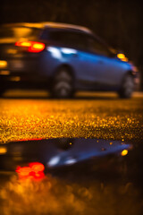 Poster - Reflection in water of a car passing on the street