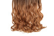 closeup texture of single piece clip in wavy brown to auburn ombre style synthetic hair extensions