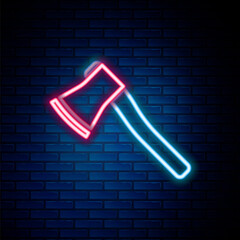 Poster - glowing neon line wooden axe icon isolated on brick wall background. lumberjack axe. colorful outlin
