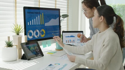 Asia people young happy female busy worker small team sale report talk consult multiple screen notebook at home office learn online reskill upskill, smart marketer startup cowork idea design career.