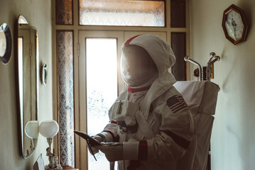 Wall Mural - astronaut coming back on earth after long time it s been abandoned. concept about science and scifi