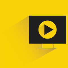 media player on desktop with shadow yellow background