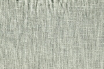 Poster - The texture of a coarse linen fabric with a clear interweaving of threads. The burlap is grey.