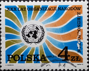 POLAND-CIRCA 1975 : A post stamp printed in Poland showing the emblem of the UN. The 30th Anniversary of the United Nations