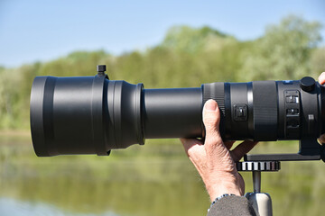 Photgraphing with a large zoom telephoto lens