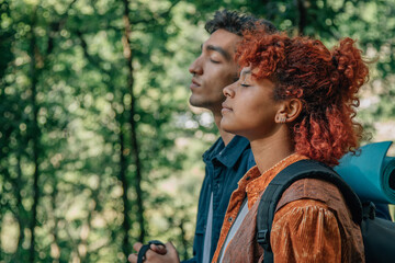 profile of relaxed couple breathing outdoors