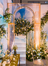 Wedding Archway With Flowers Arranged For A Wedding Ceremony