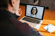 © Xavier Lorenzo/Westend61 - Smiling female doctor on video call consultation with senior male patient at home Covid-19